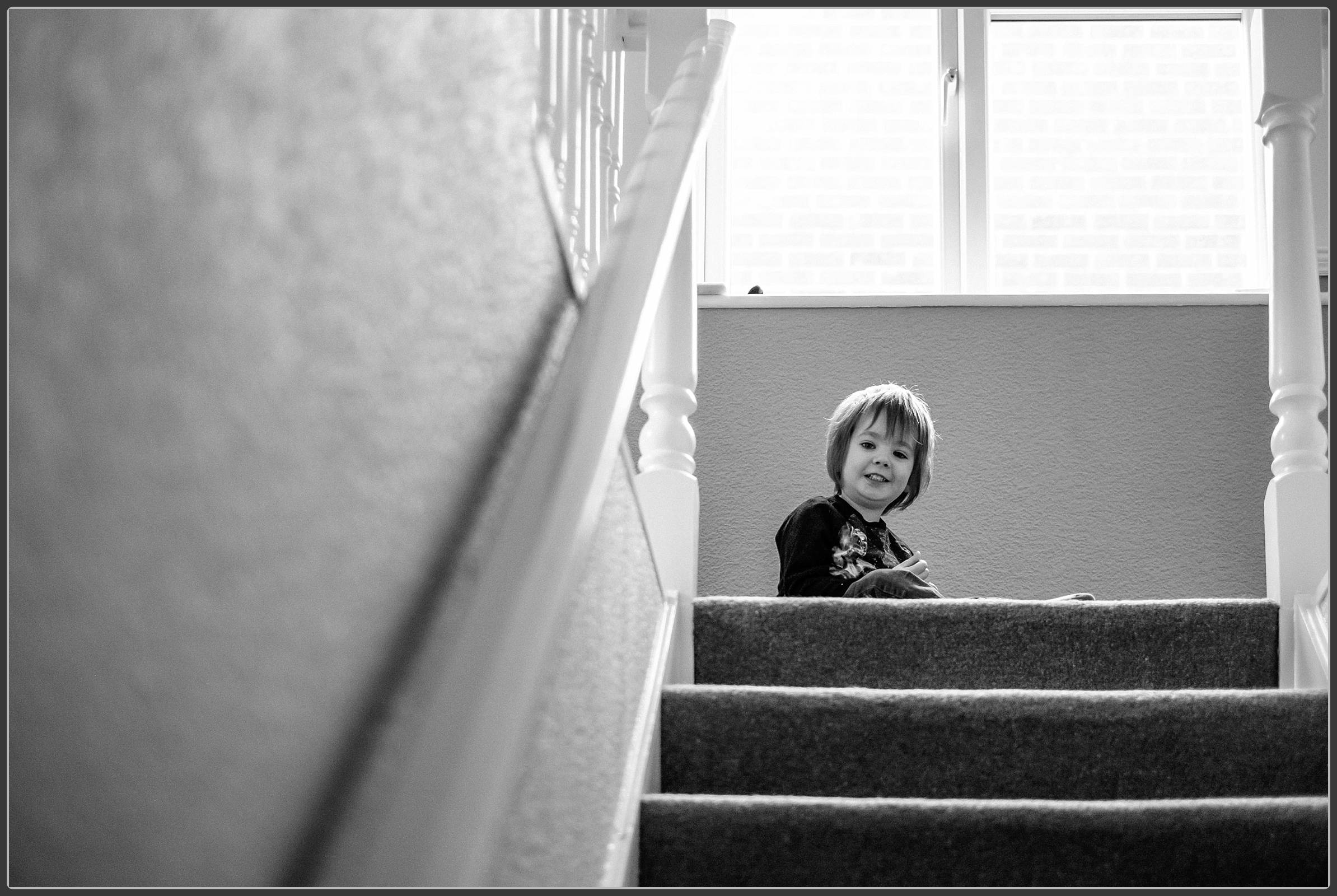 Child playing in black and white