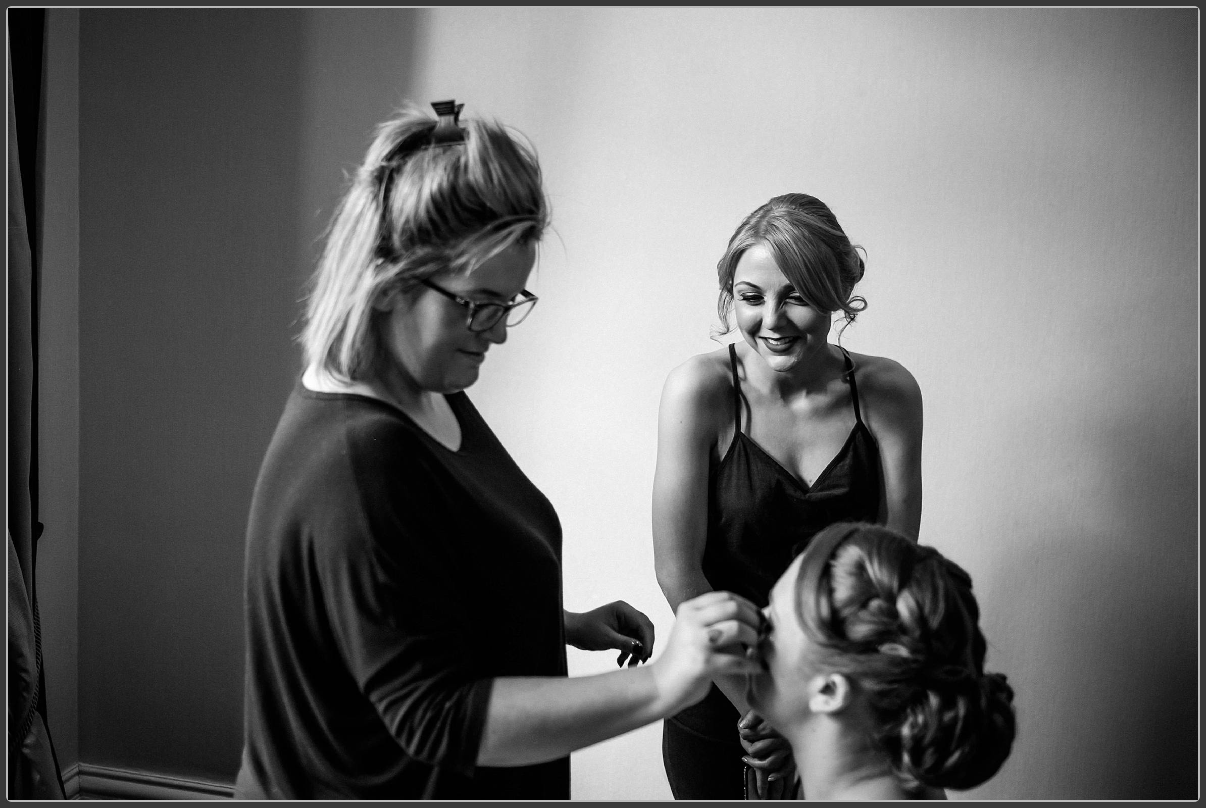 The bride having her makeup done 2