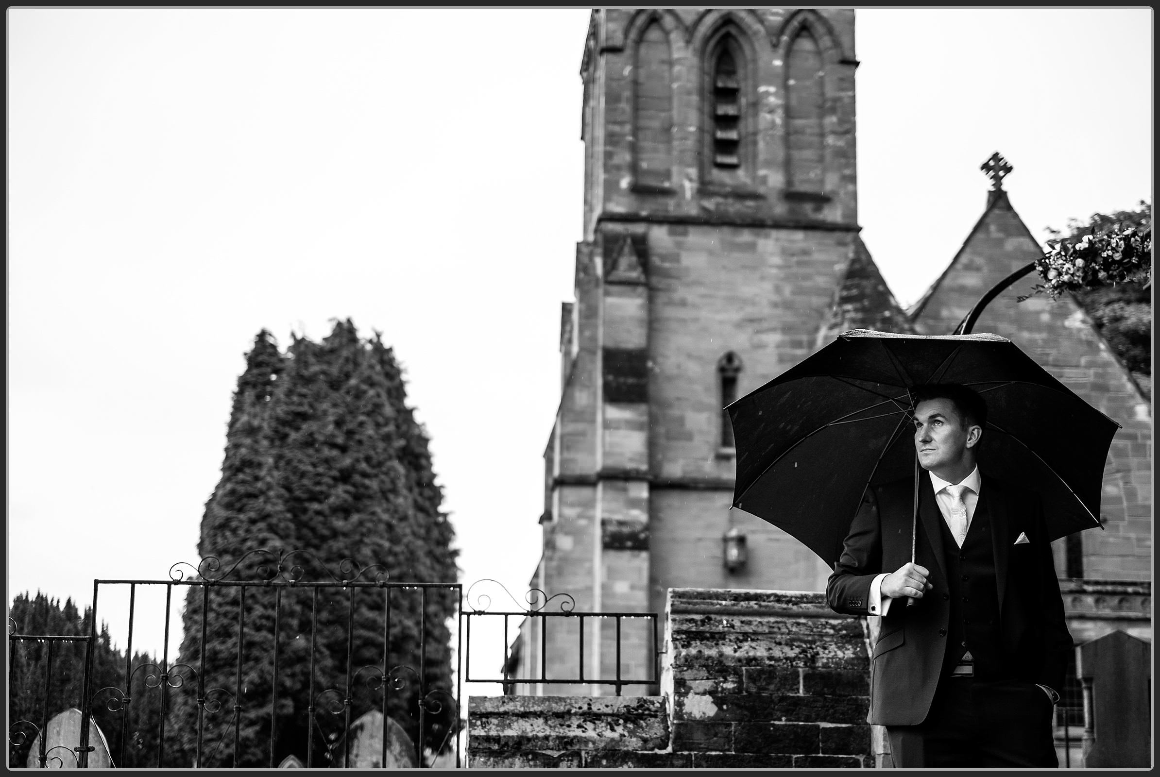 The groom outside the church