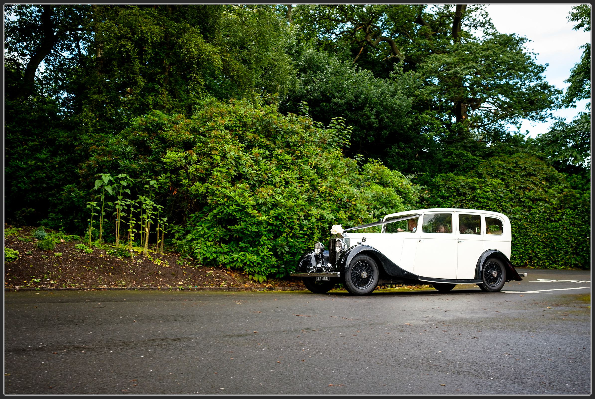 The wedding car arriving