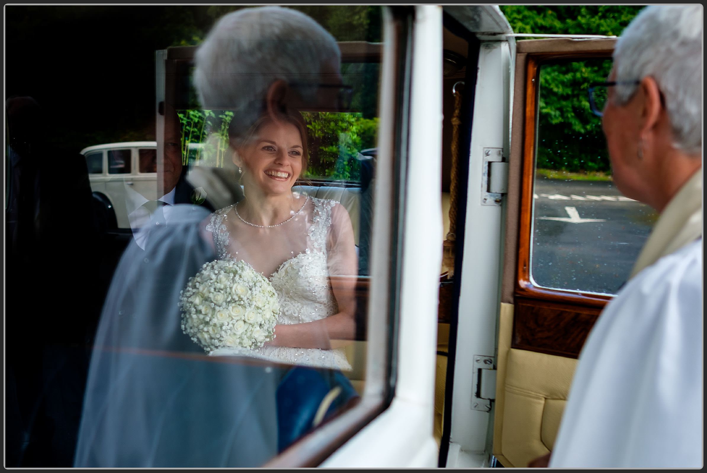 Bride in the wedding car