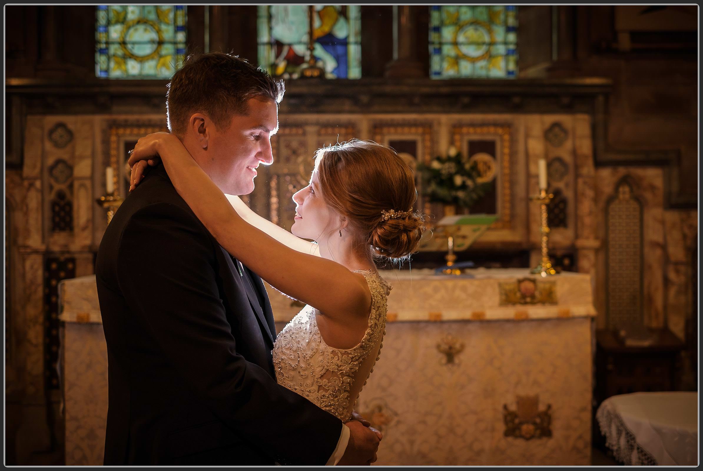 Bride and groom together at St Peter's Church