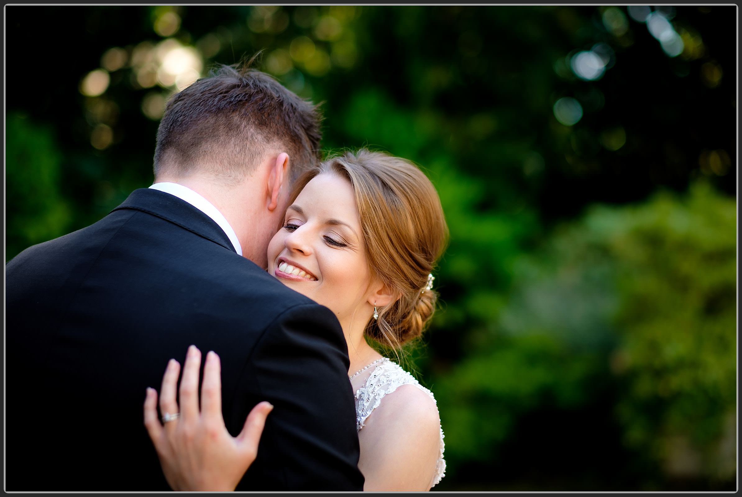 Bride hugging her groom