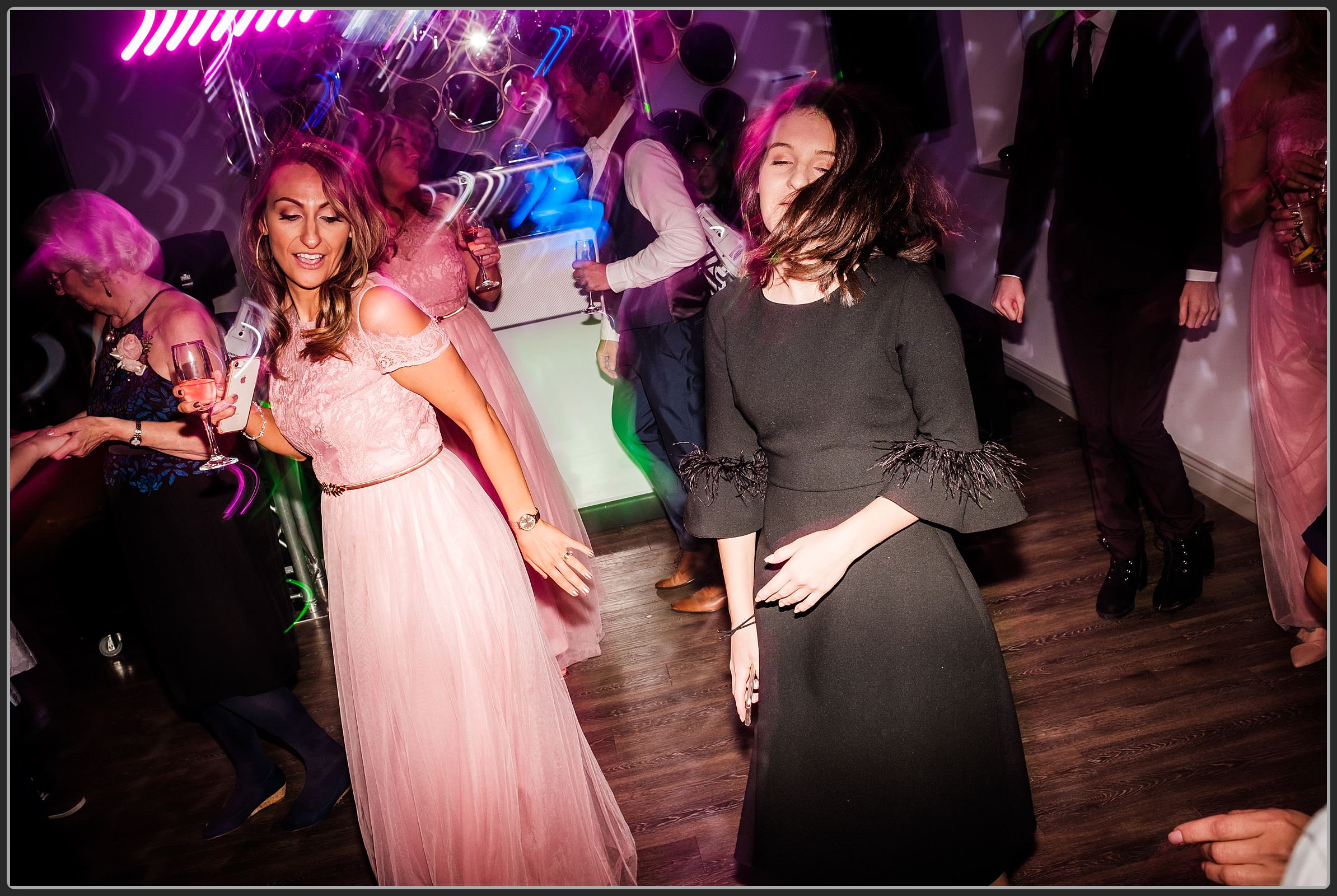 Wedding guests dancing