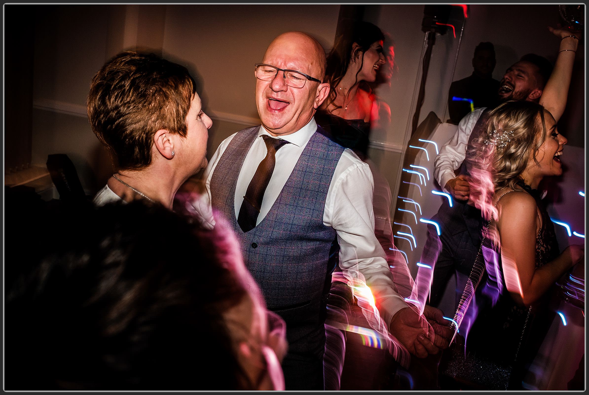 Wedding guests dancing