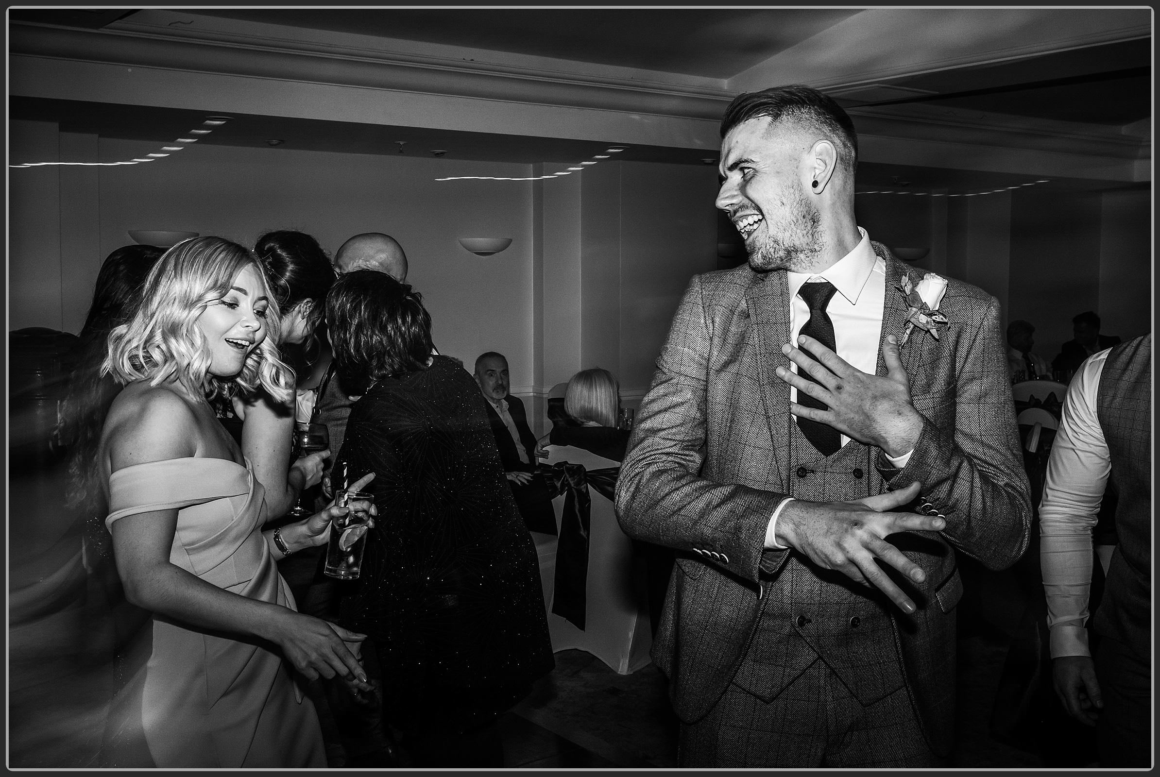 Wedding guests dancing