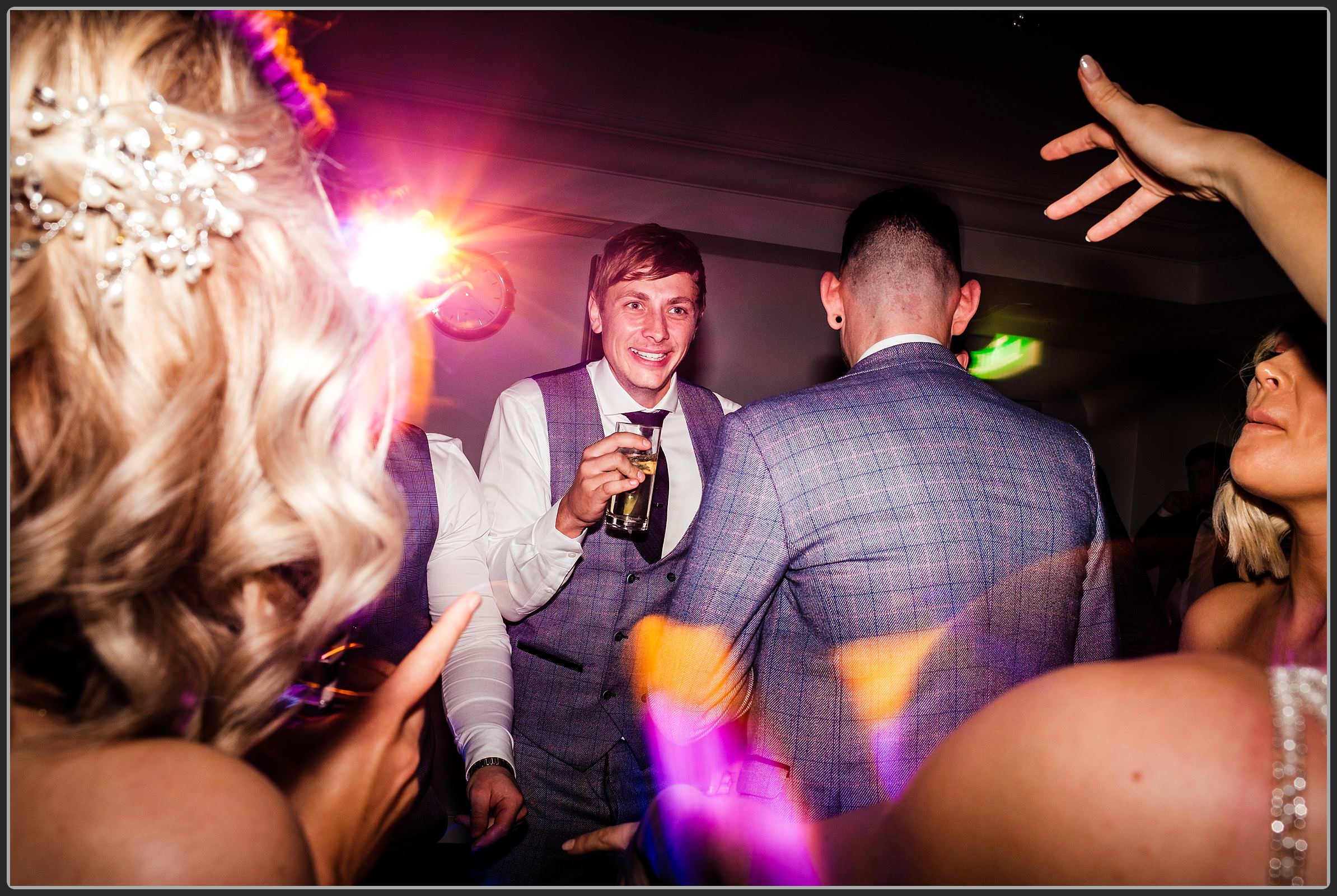 Wedding guests dancing