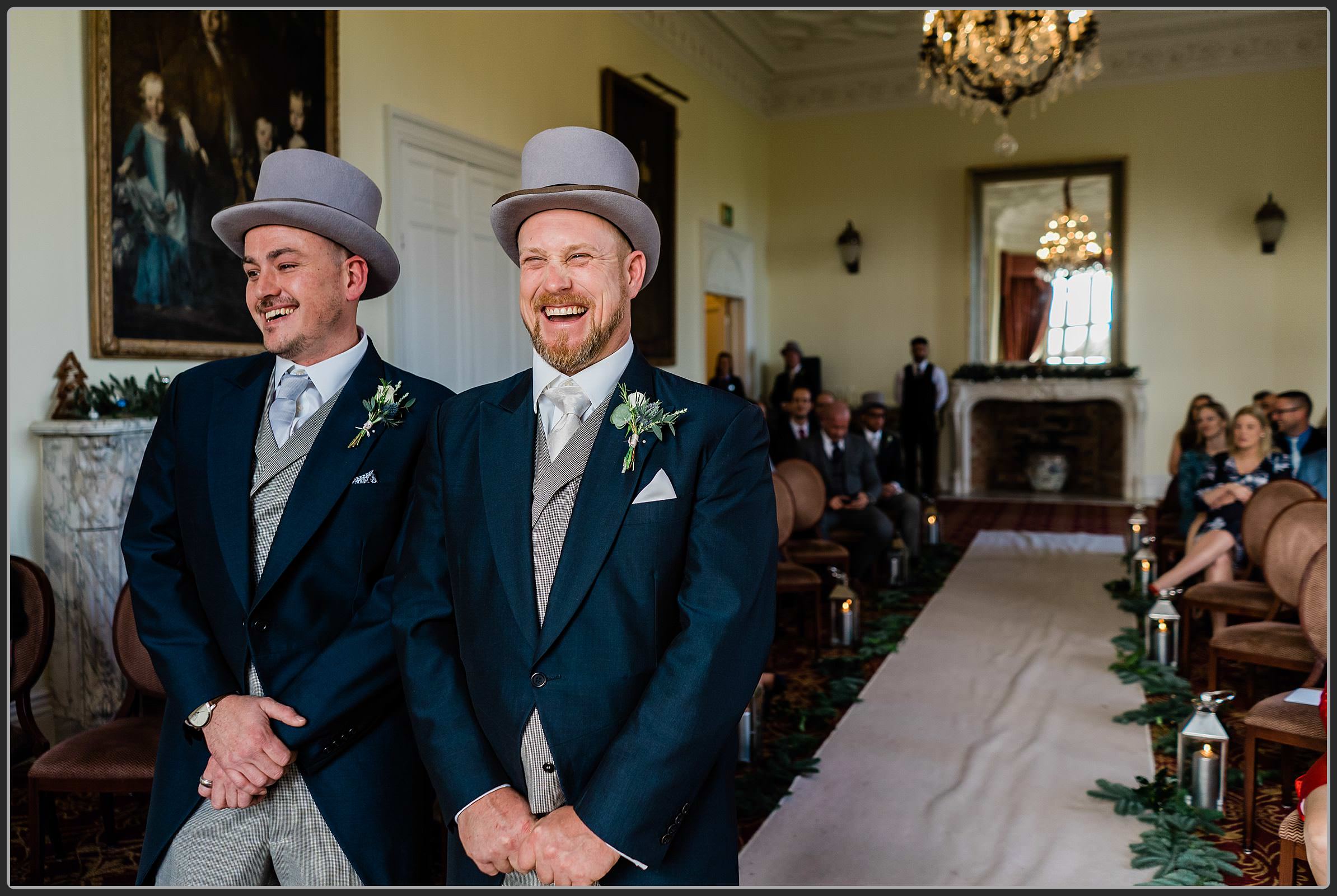 Groom and best man awaiting the bride to walk down the aisle