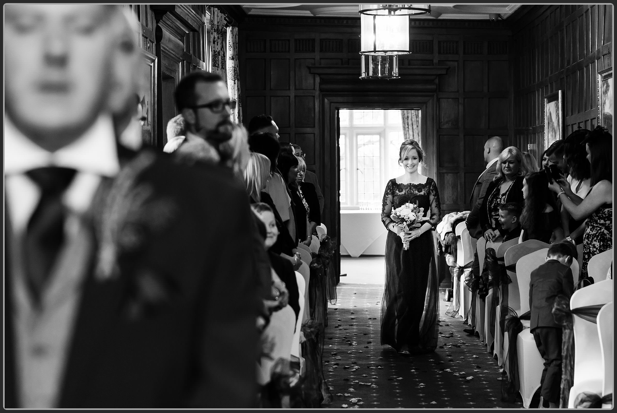 Bridesmaids walking down the aisle