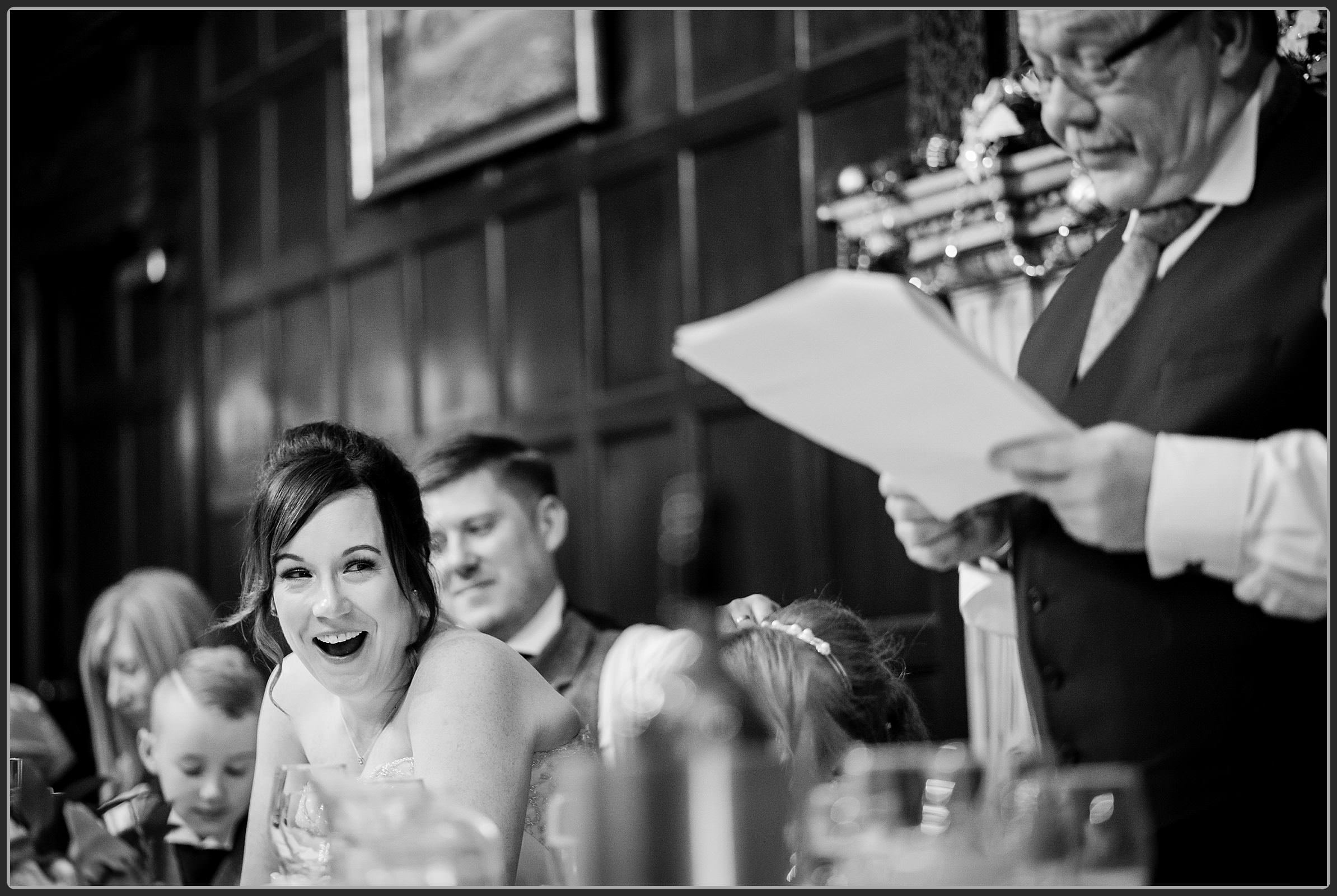 Robyn laughing during the wedding speeches