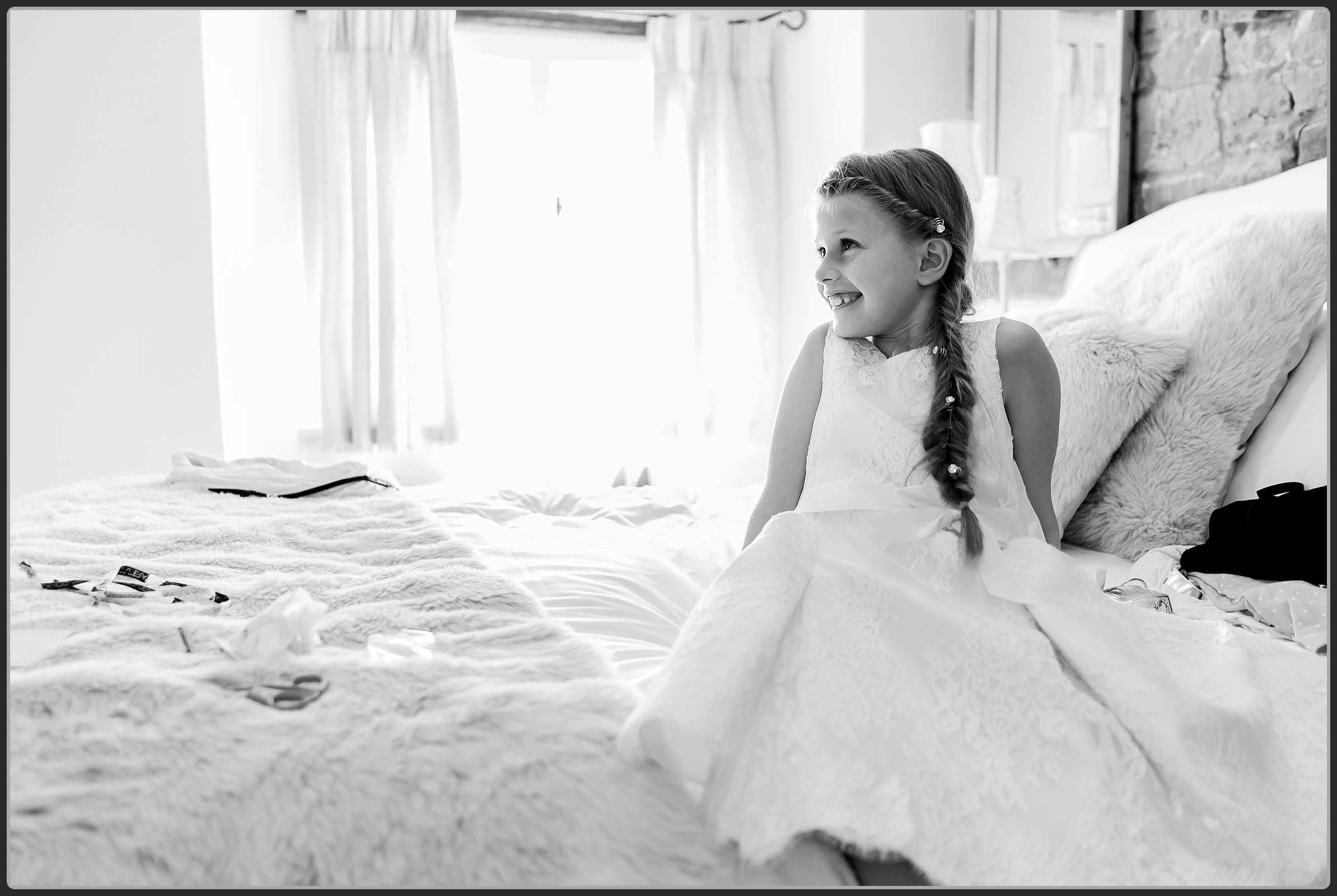 Flower girl on the bed