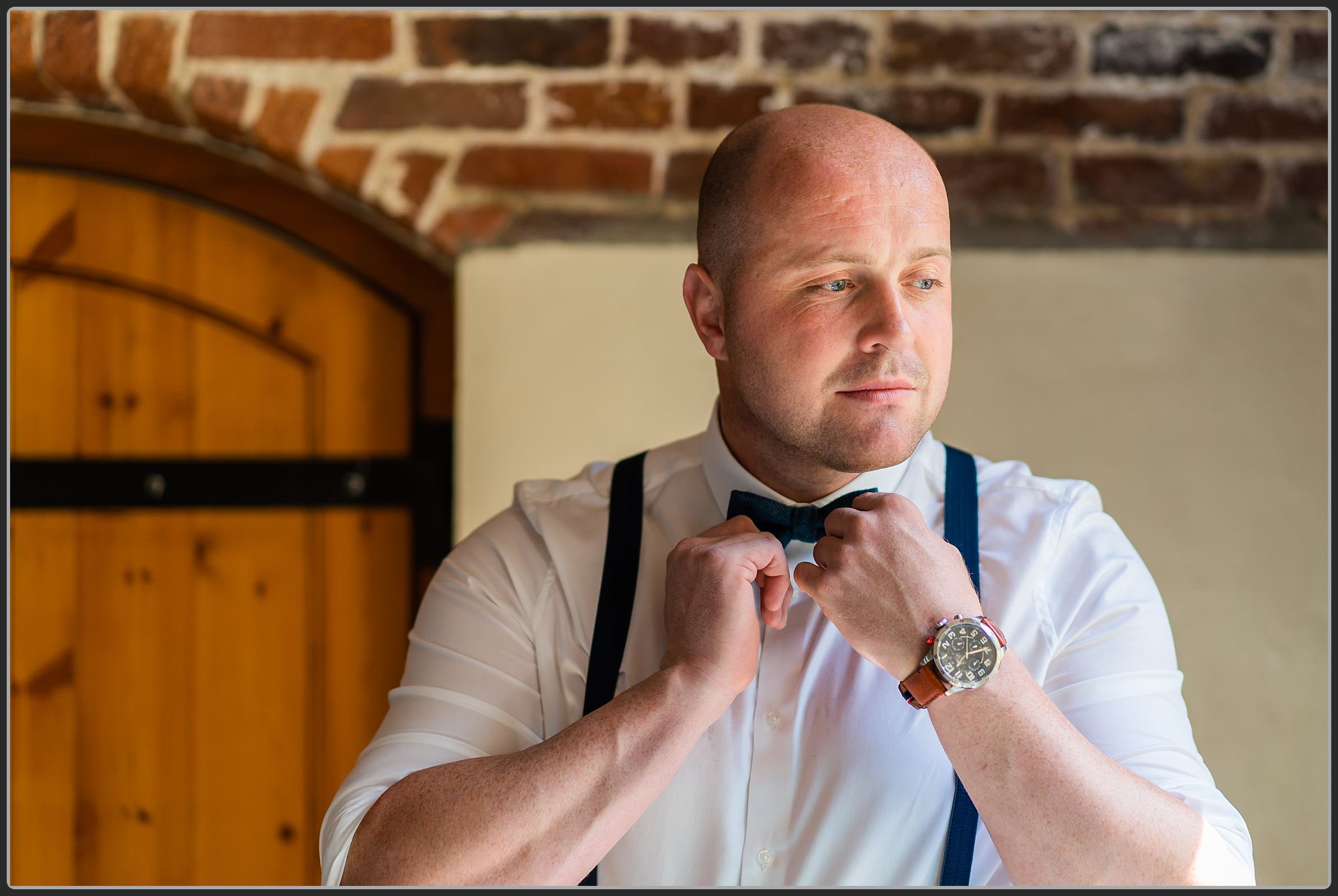 The groom getting ready