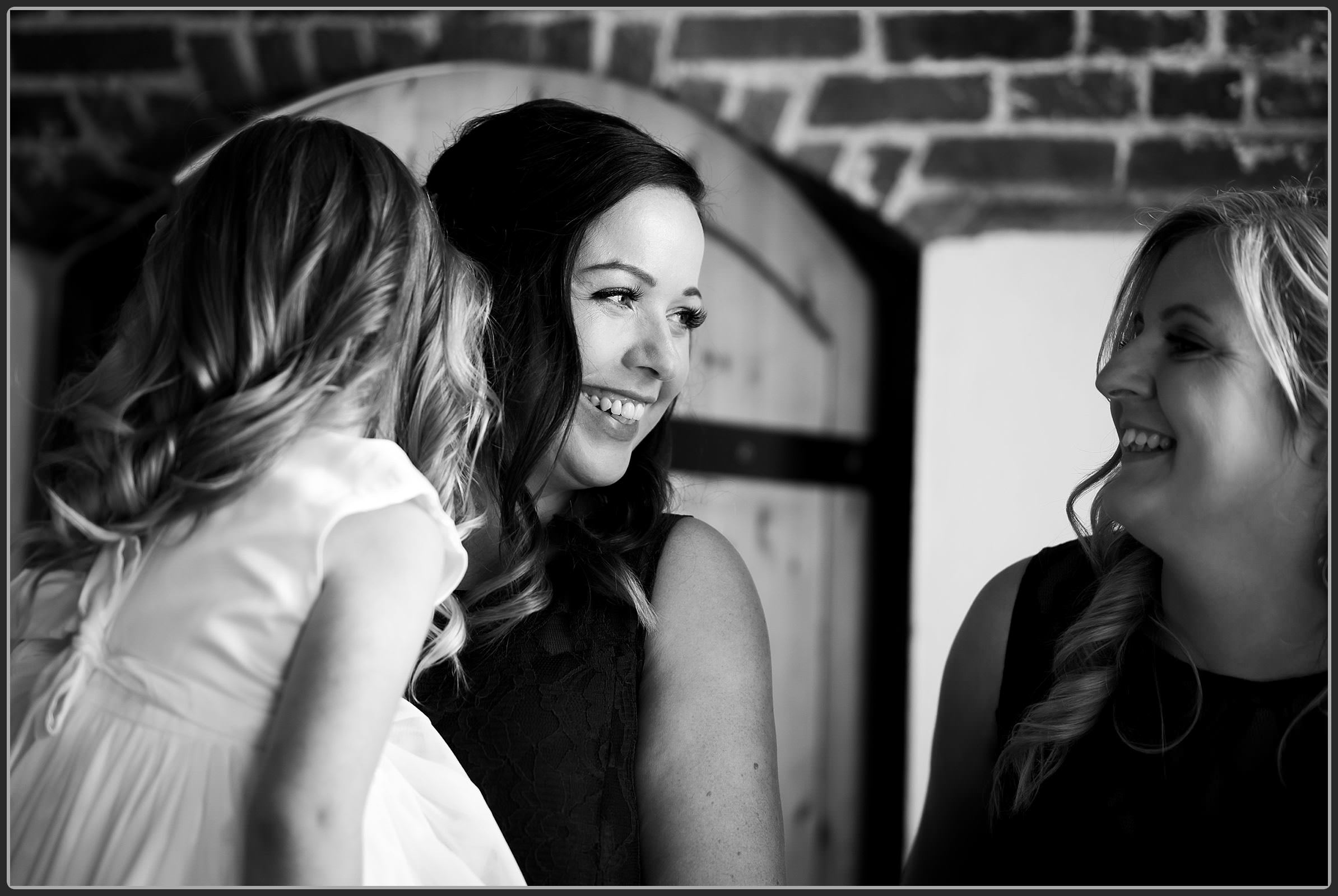 The bridesmaids laughing