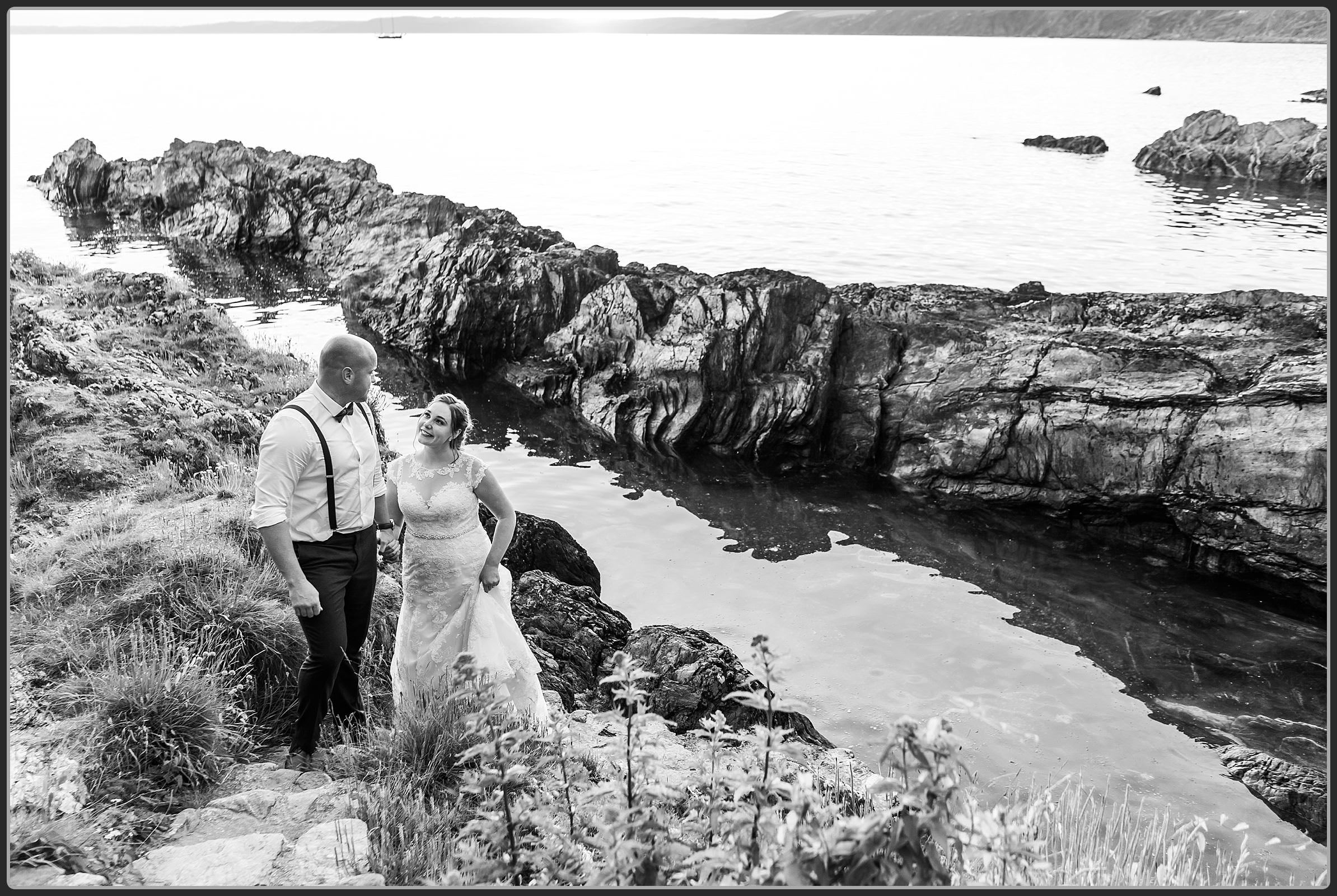 Bride and groom on the beach steps together