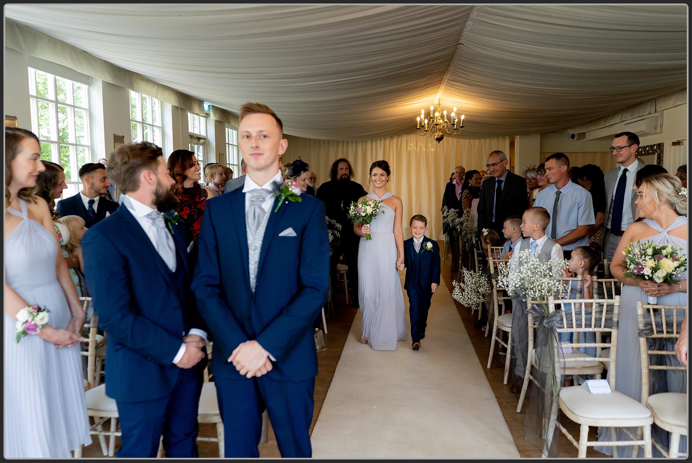 The bridal party walking down the aisle