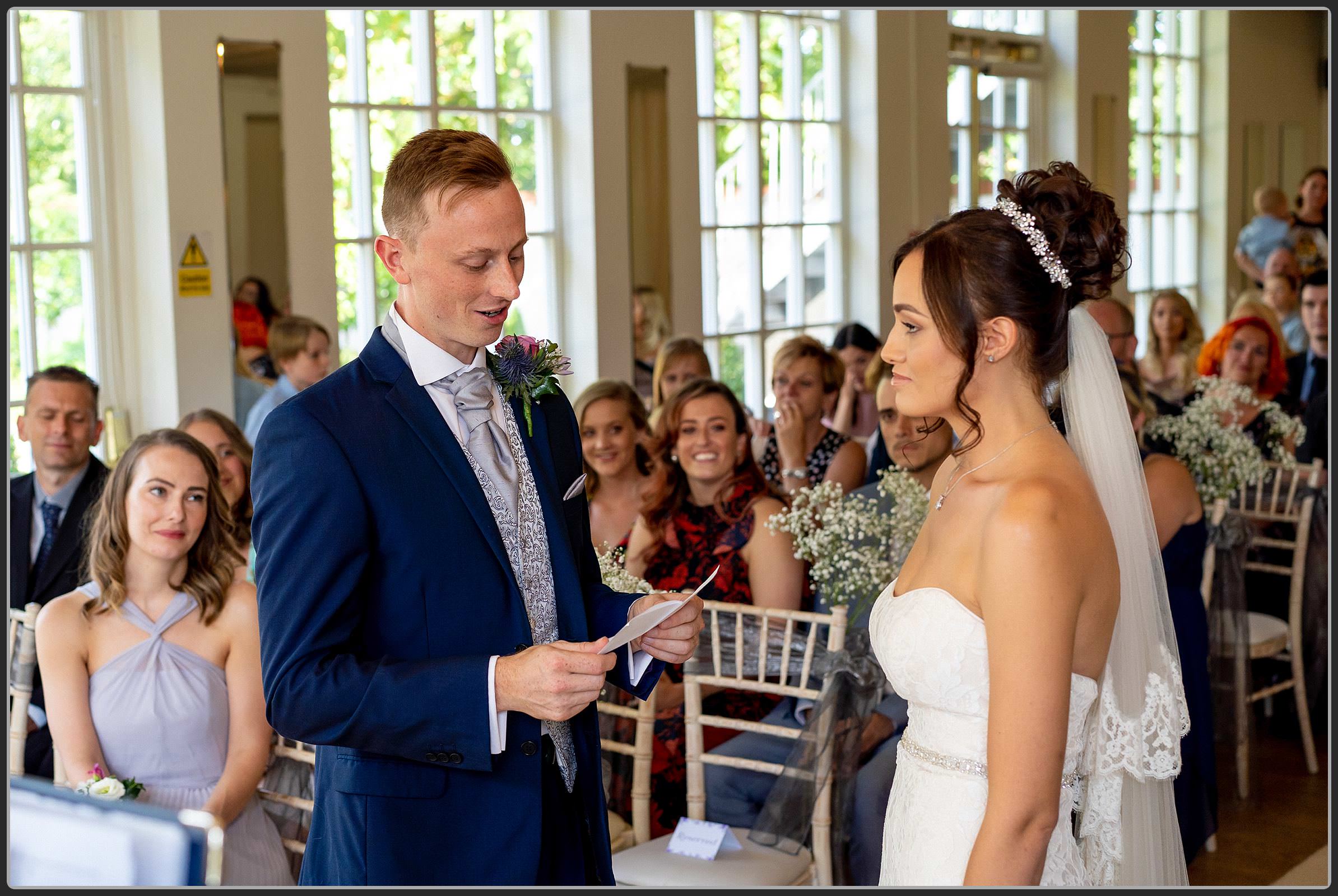 The Bride and Groom during the ceremony at Warwick House