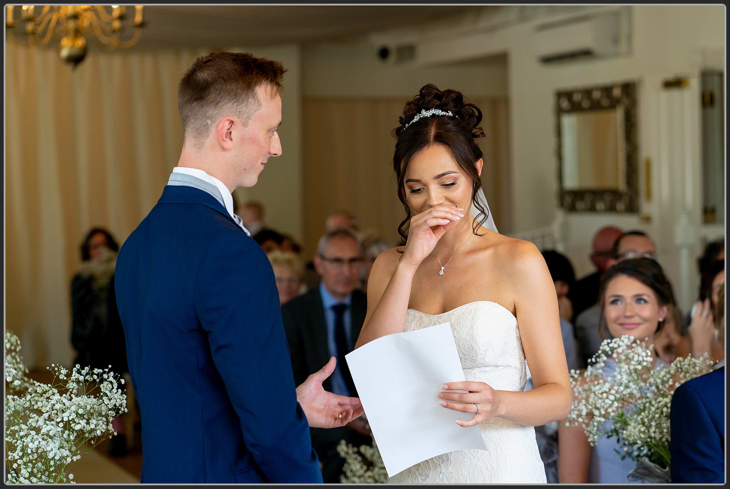 The Bride and Groom during the ceremony at Warwick House