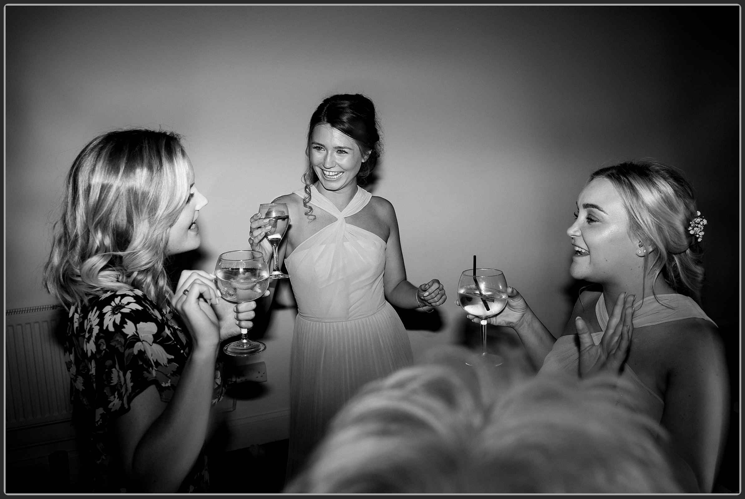 The wedding guests dancing