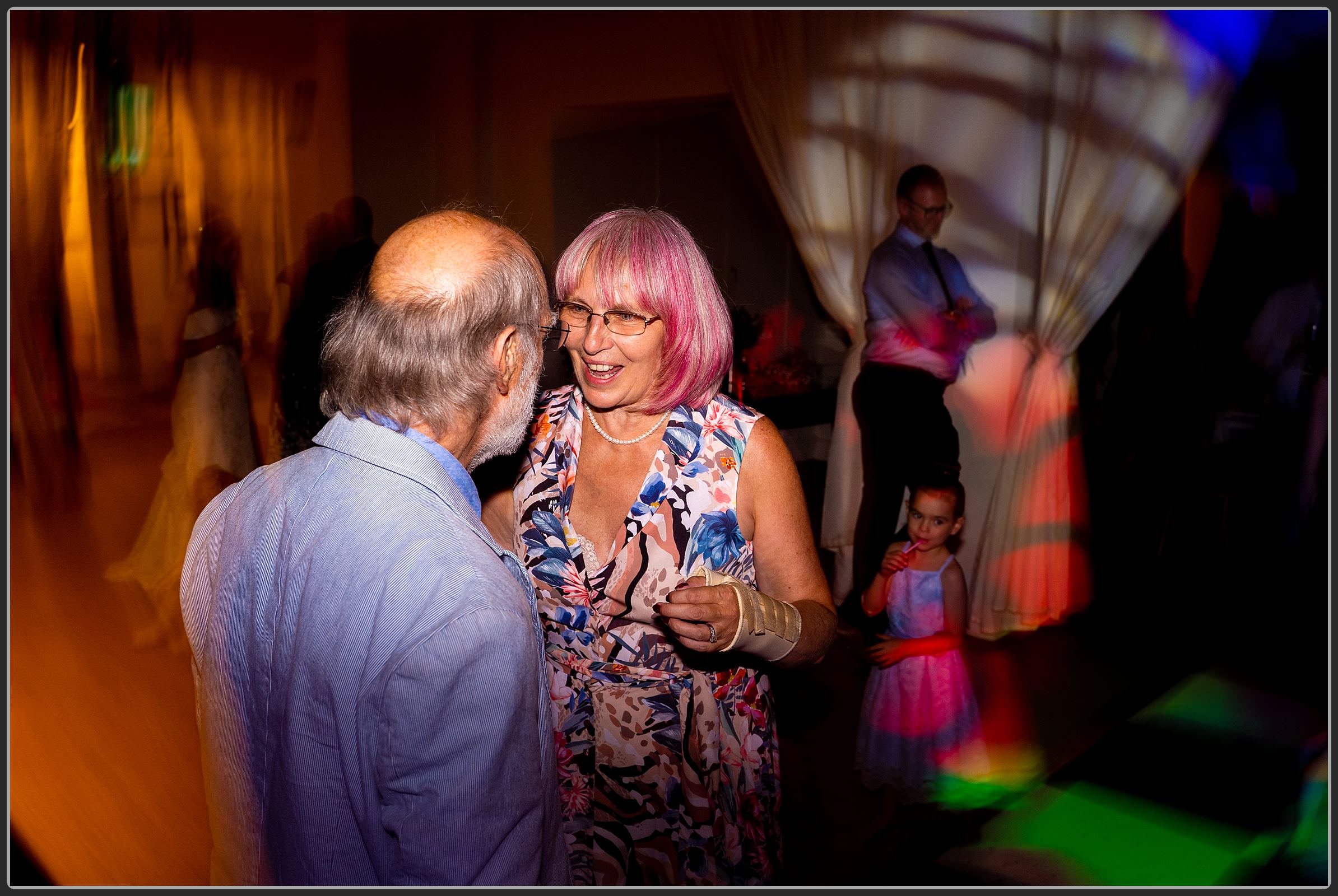 The wedding guests dancing