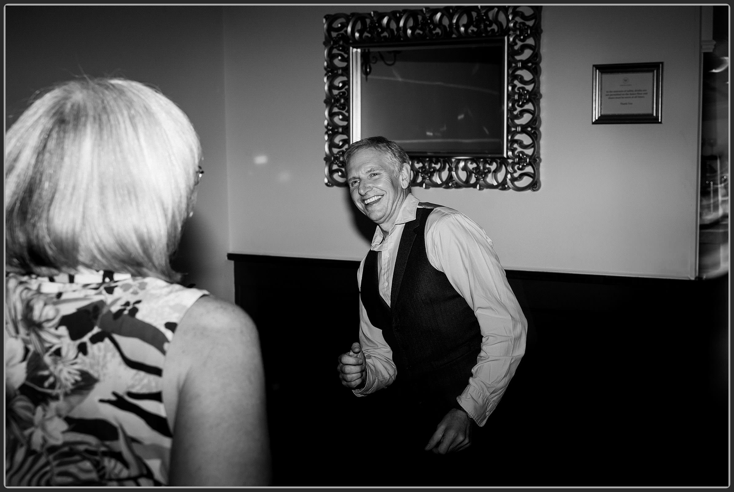 The wedding guests dancing