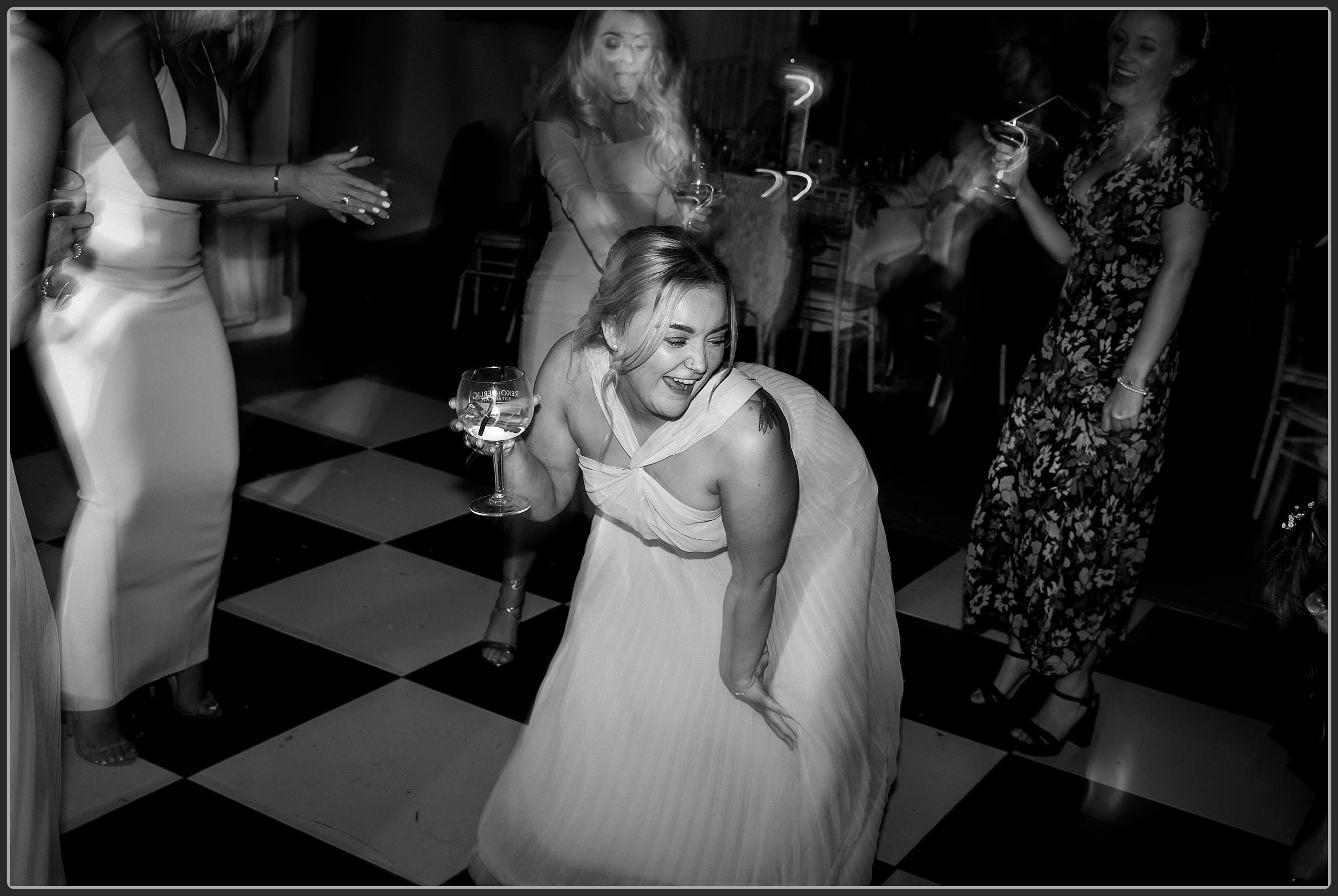 The wedding guests dancing