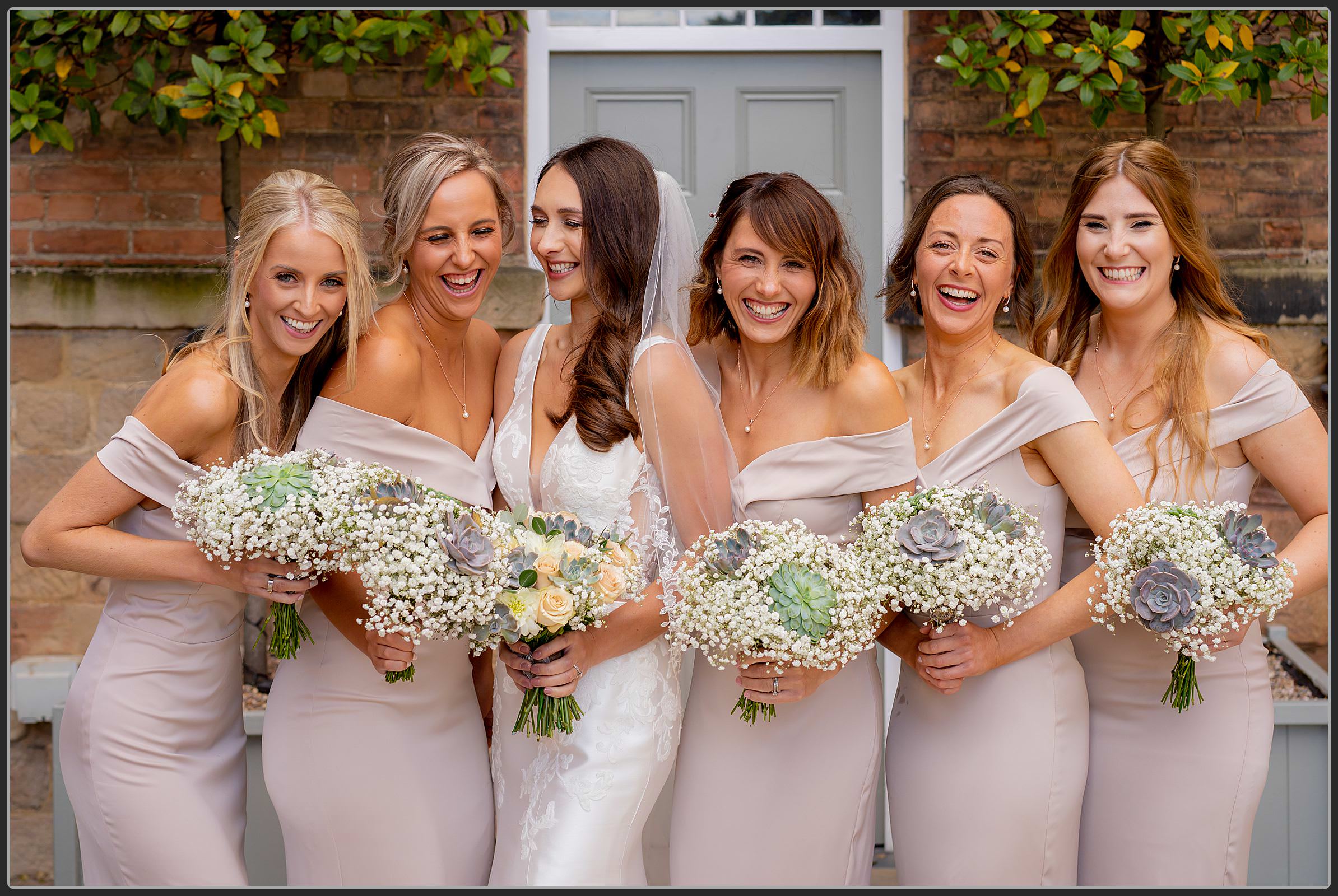 Ellie and her bridesmaids laughing