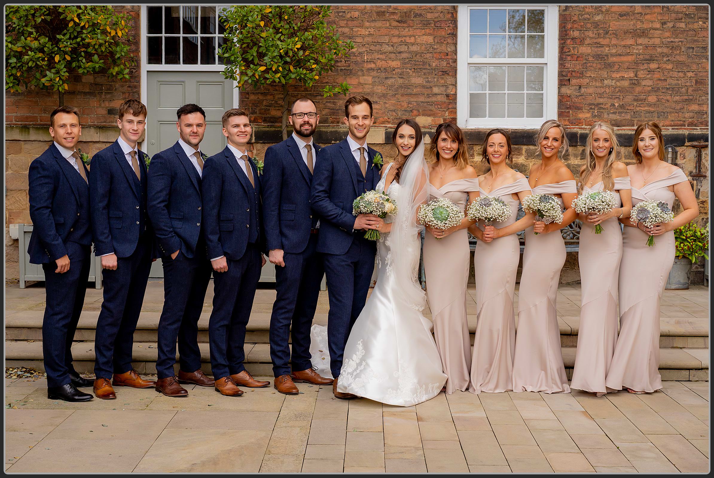 Groomsmen and bridesmaids together