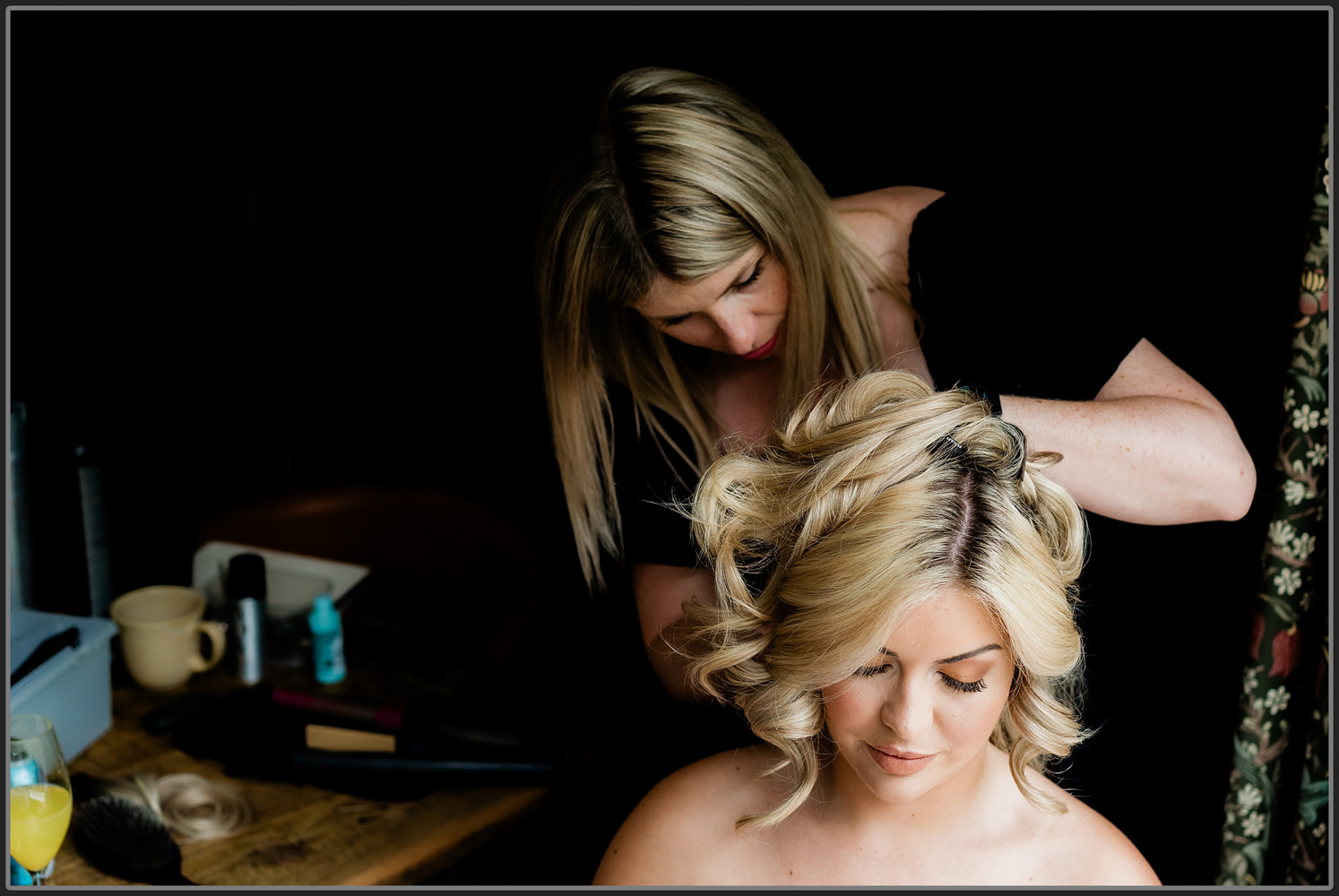 The bride getting her hair done