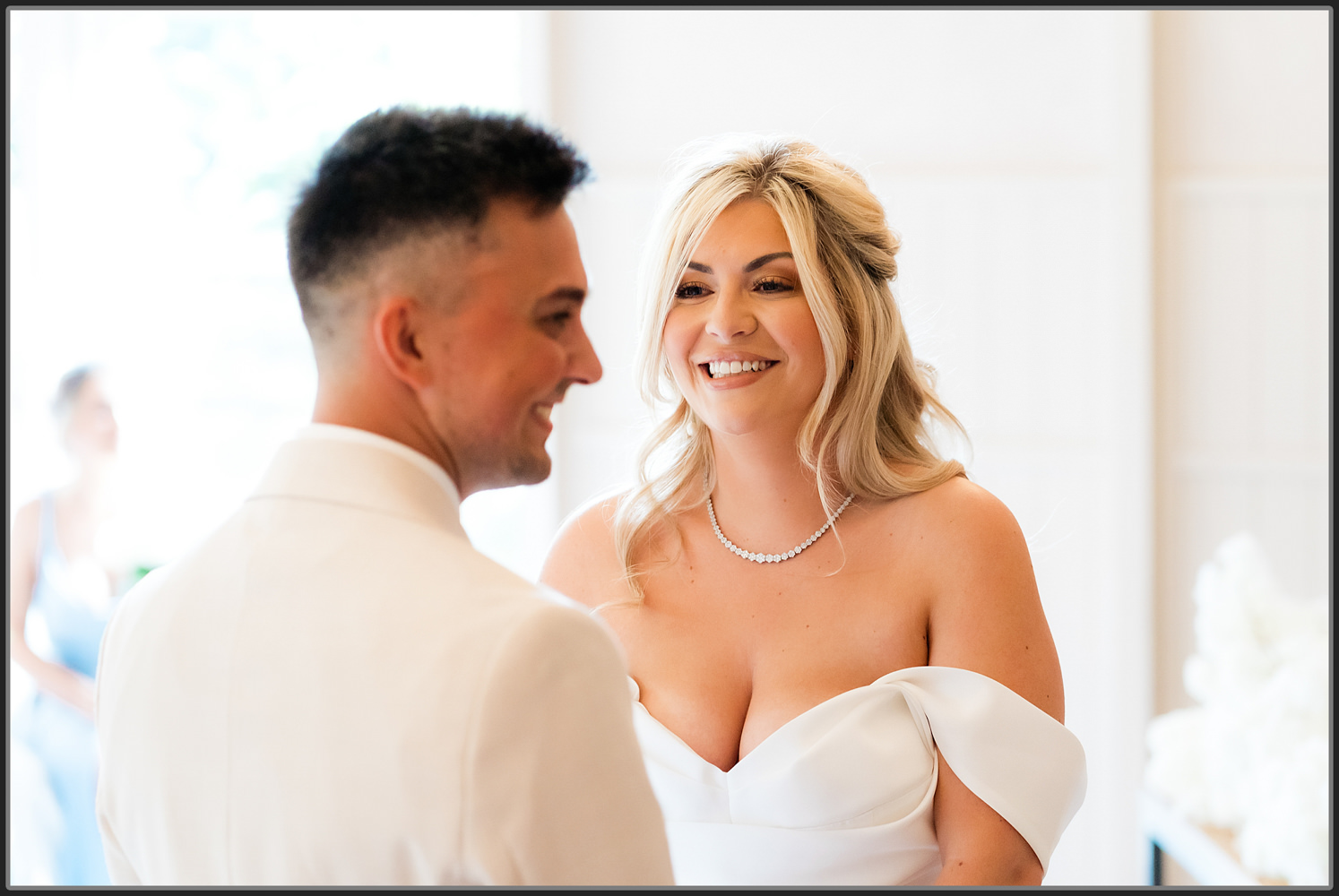 The bride laughing during the ceremony