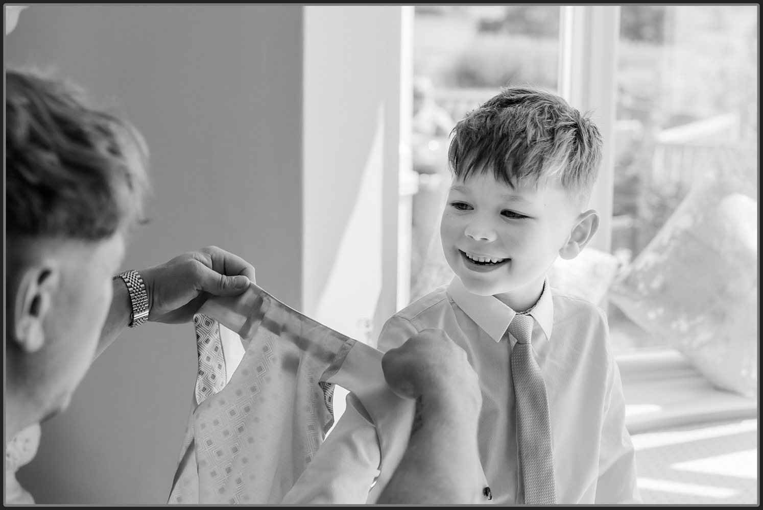 Groomsmen's boy getting ready