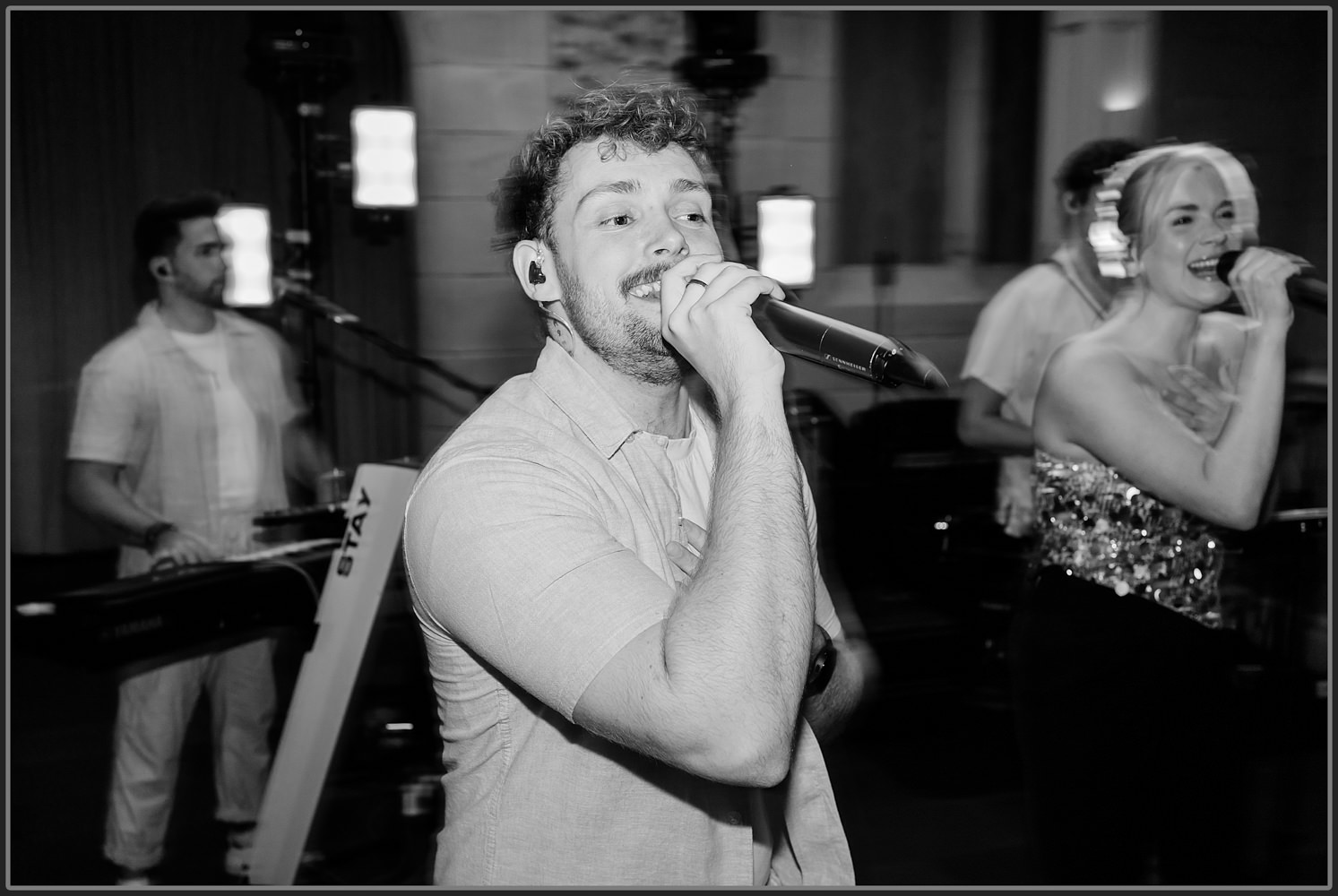 Ultra Glow band singing at Hampton Manor